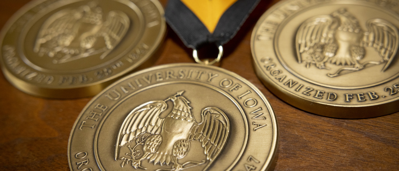 Faculty honors medallions from the College of Liberal Arts and Sciences annual faculty meeting.
